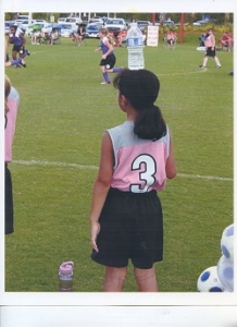Young girl with water bottle on headv 250v344.jpg